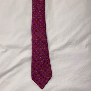 Hermès men’s burgundy wine colored 100% silk tie with race horses